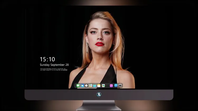
艾梅柏·希尔德 (Amber Heard) 身穿黑色连衣裙