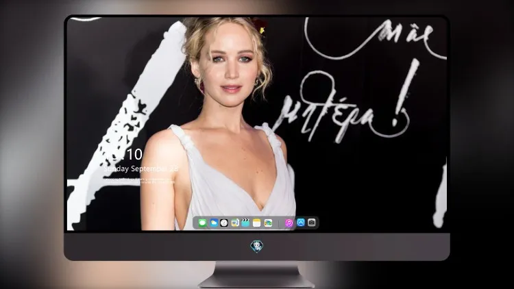 
詹妮弗·劳伦斯 (Jennifer Lawrence) 身穿白色连衣裙