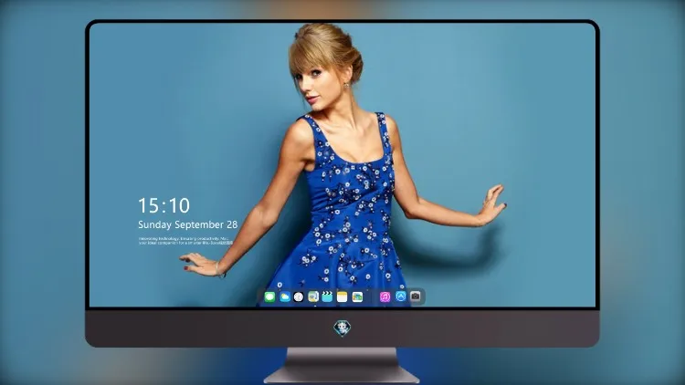 
泰勒·斯威夫特 (Taylor Swift) 身穿蓝色连衣裙